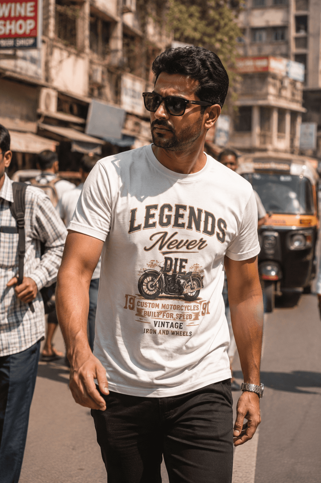 Indian man wearing MENZA graphic printed tee with bold artwork design, Mumbai street style