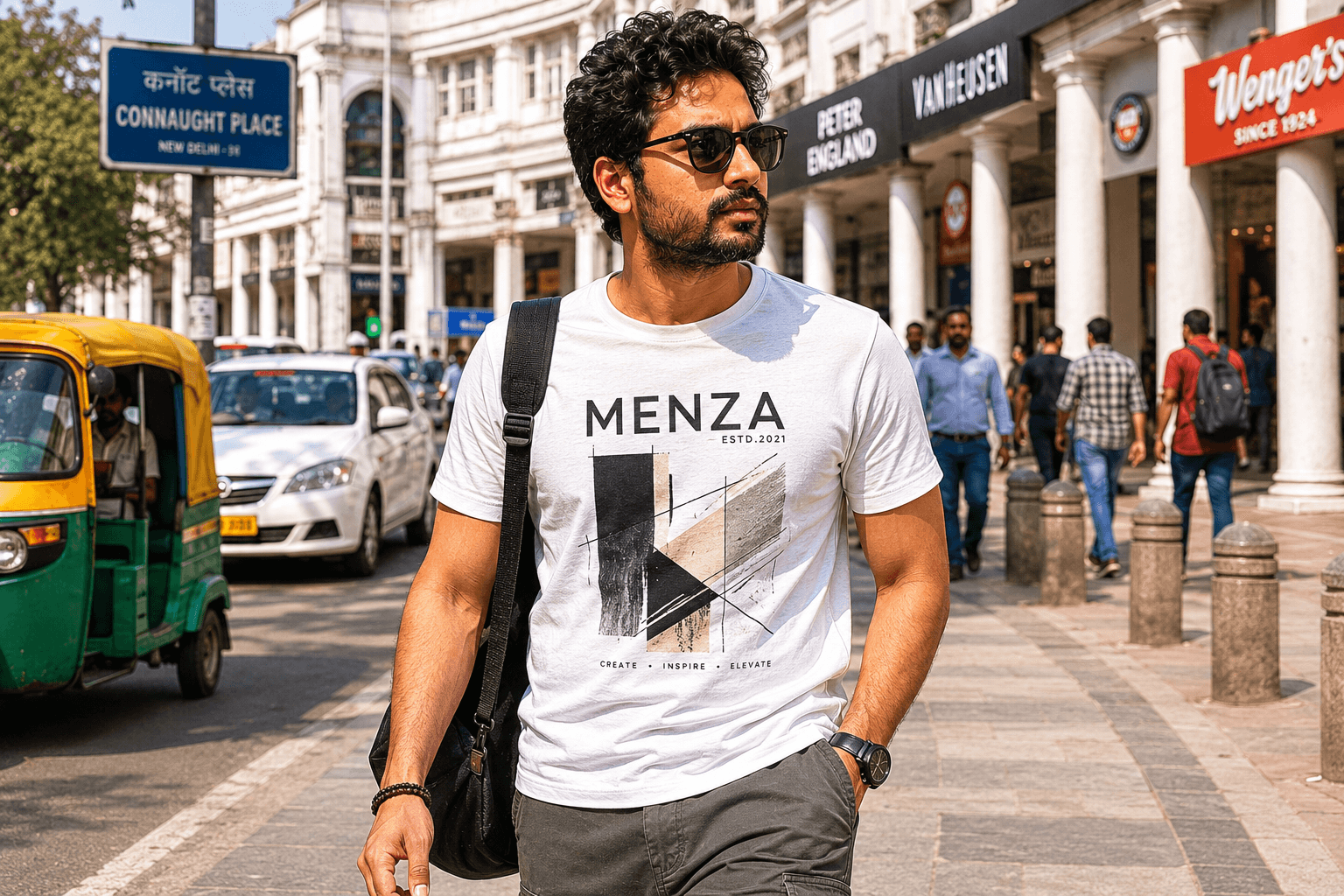 Indian man wearing MENZA graphic printed tee with bold artwork design, Mumbai street style